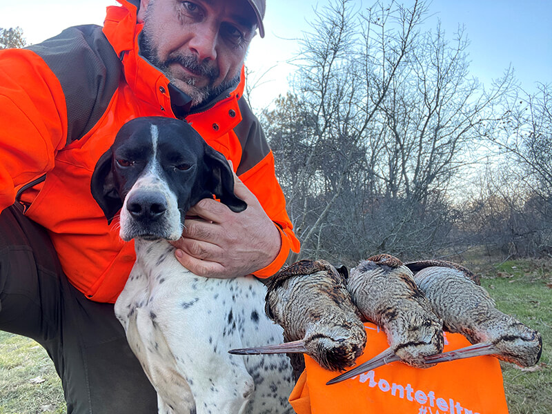 A happy client with his pointer and the rich woodcock bag
