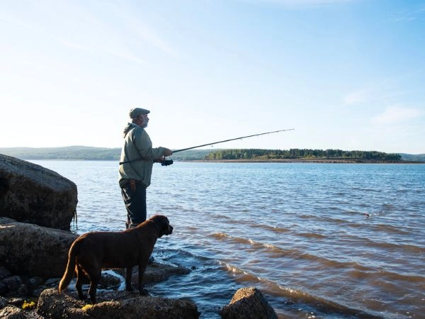 Fisherman with his dog 